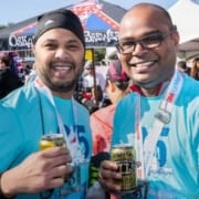 Participants enjoy a cold Oskar Blues beer, the Official Beer Sponsor of the 3M Half Marathon.
