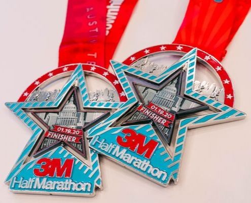 2020 finisher medal for the 3M Half Marathon presented by Under Armour.