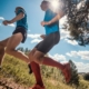 Two trail runners run together to stay safe.