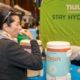 Participant drinks Nuun, the Official Hydration of the 3M Half Marathon.