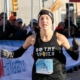 Image of Jess Harper as she crosses the 2019 3M Half Marathon finish line as the female champ. She is the 2018 and 2019 female champ and will run with the 2020 elite field.