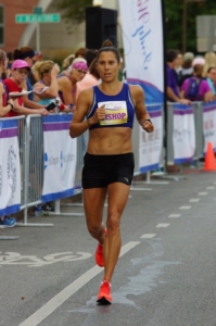 Image of Sarah Bishop running a race. She will run with the 2020 elite field at the 3M Half Marathon presented by Under Armour.