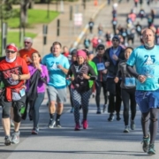 Image of group of runners during the 2019 3M Half Marathon presented by Under Armour. 2020 3M Half Marathon announces the return of Ascension Seton as the Official Medical Provider.