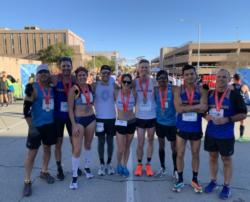 Members of Rogue Running pose for a picture at the 2020 3M Half Marathon. The 2020 3M Half Marathon presented by Under Armour provided plenty of PRs!