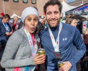 Image of two runners celebrating at the Oskar Blues Austin beer garden at the 2019 3M Half Marathon finish line festival. This blog has everything you need to get ready for the 2020 3M Half Marathon!