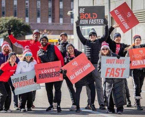 Image of Camp Gladiator trainers cheering for participants of the 2019 3M Half Marathon. CG returns as the Official Community Fitness Partner of the 3M Half Marathon for the second year in a row.