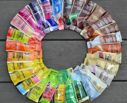 Image of GU gels arranged in a circle by the color of their package. GU is the Official Energy Gel and Chew of the 3M Half Marathon. Their advice in this blog will help you perform your best on race day!