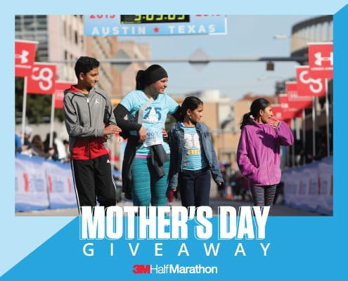 Image of a mother crossing the 2019 3M Half Marathon finish line with her three kids walking beside her. Enter your mom to the 3M Half Marathon Mother's Day Giveaway and she could win a free SPIbelt!