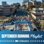 Drone image of hundreds of runners crossing the 2020 3M Half Marathon finish line. Design features text that reads September Running Playlist, 3M Half Marathon's newest monthly playlist for runners.