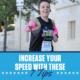 Female runner shows the peace sign with her right hand during the 2020 3M Half Marathon. Text on design reads Increase Your Speed with these 7 Tips. Learn more at https://downhilltodowntown.com/increase-your-speed/