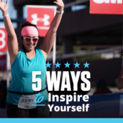 Female runner triumphantly crosses the 3M Half Marathon with her arms raised in the air. Text on design reads 5 Ways to Inspire Yourself. Read more at https://downhilltodowntown.com/inspire-yourself/