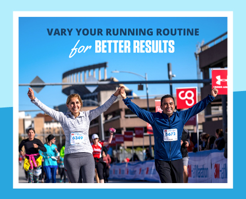 Two runners cross the 2020 3M Half Marathon finish line with their arms raised in the air and big smiles on their faces. Text on design reads Vary Your Running Routine for Better Results. Read more at http://im8.22e.myftpupload.com/vary-your-running-routine/